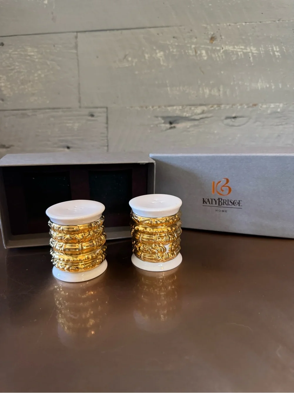 Katy Briscoe salt & pepper shakers made of bone white china with 24 carat gold.
